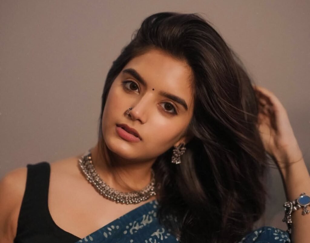 Priyanshi Yadav: Delhi to TV Fame, Bio, Career and more A women name priyanshi yadav with long hair wearing a blue sari and a necklace